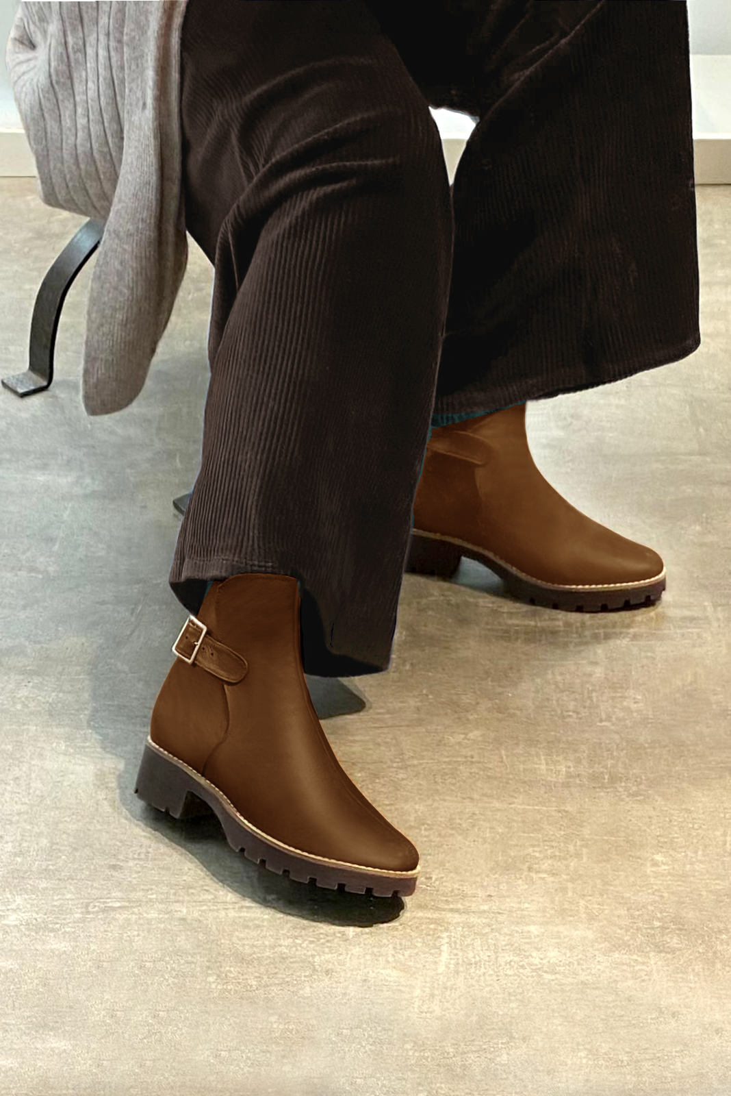 Caramel brown women's ankle boots with buckles at the back. Round toe. Low rubber soles. Worn view - Florence KOOIJMAN